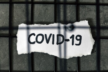 COVID-1p written on paper