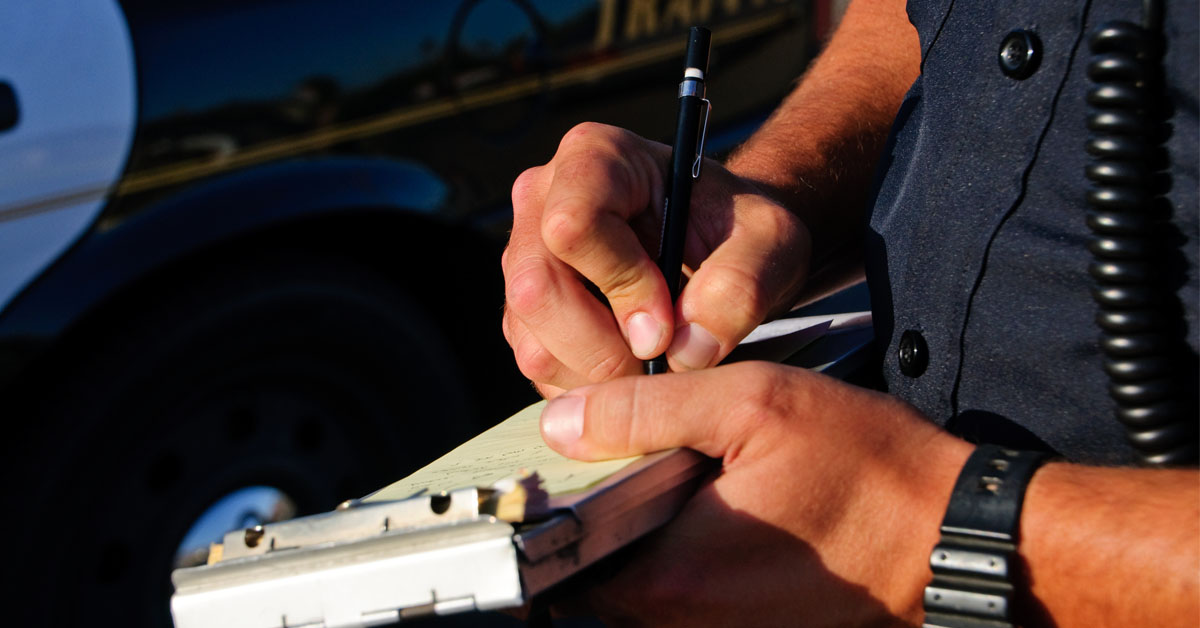 Officer writing a ticket